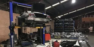 NMW-ferrari-wrecker-Ferrari-612-Scaglietti-used-parts-on-the-hoist